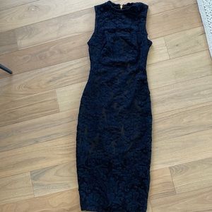 Stunning navy lace body con dress with full gold zipper in the back